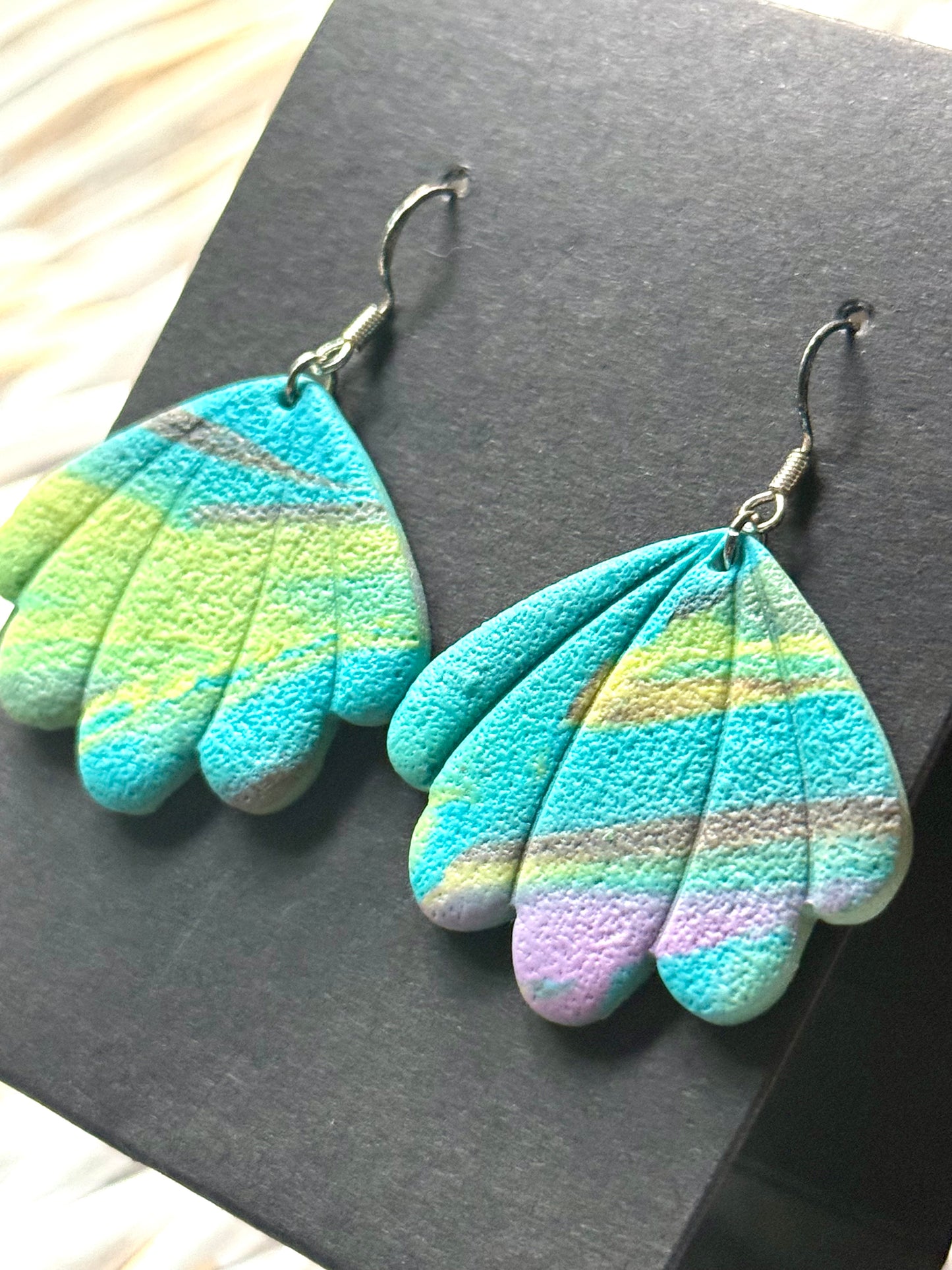 Blue green swirl shell dangle