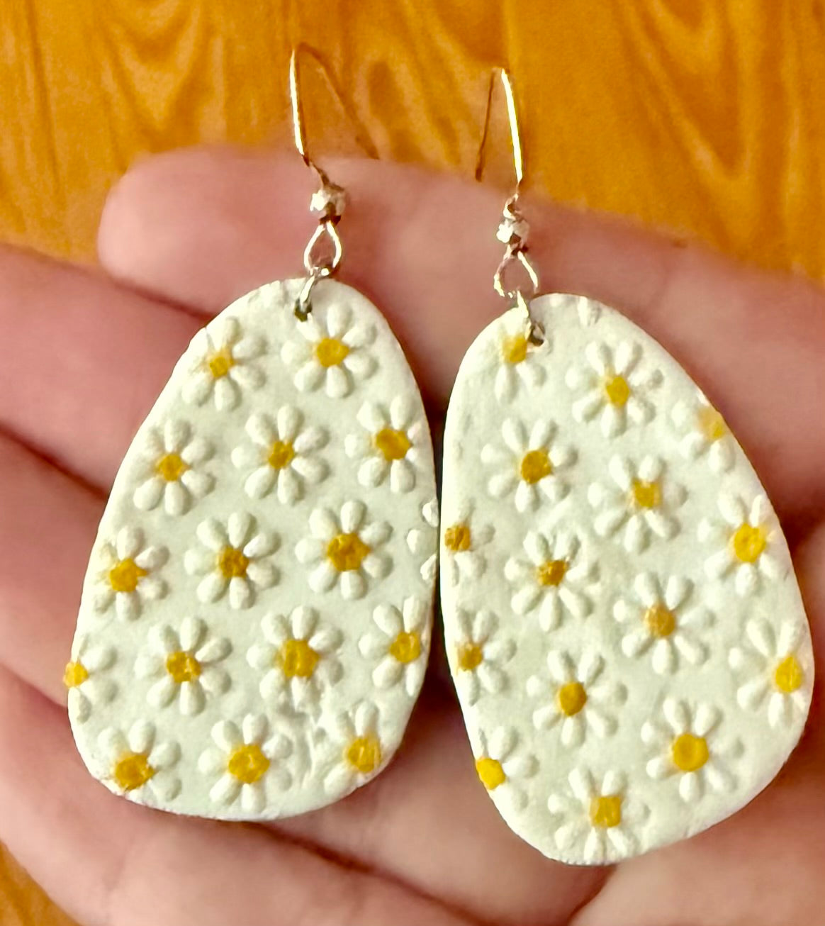 White oval daisy yellow polka dot dangle earrings