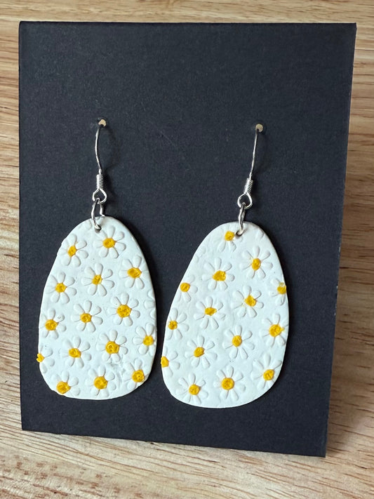 White oval daisy yellow polka dot dangle earrings