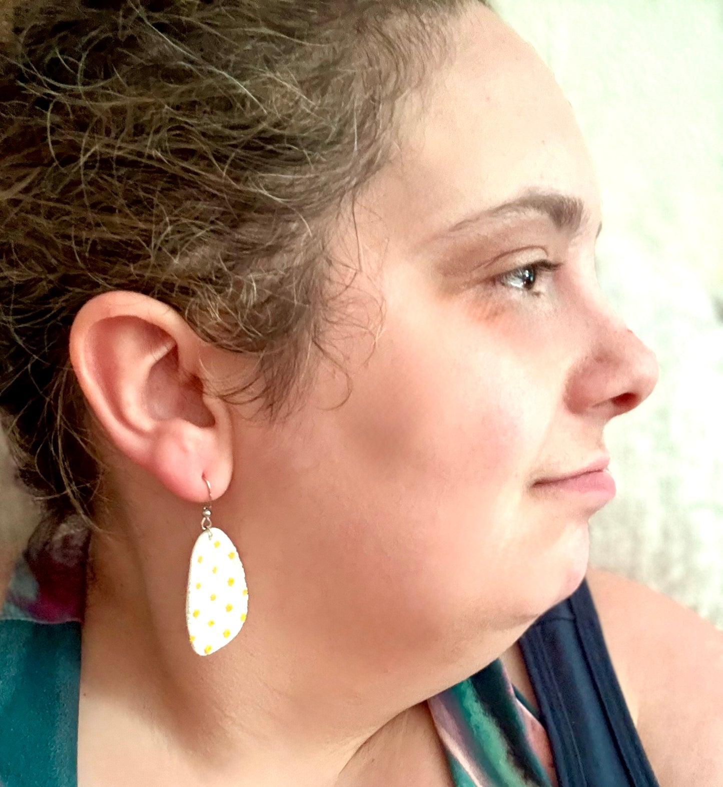 White oval daisy yellow polka dot dangle earrings